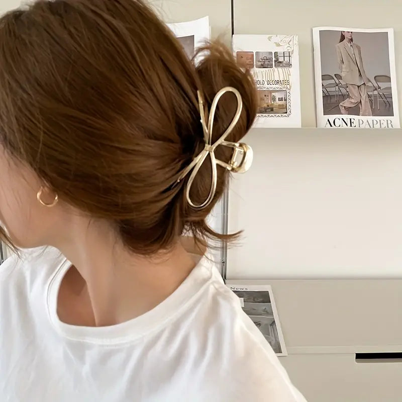 Pinza para el pelo con forma de metal dorado 