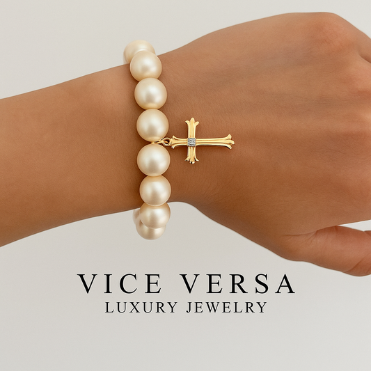 Pulsera de perlas con forma de cruz