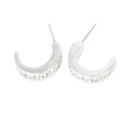 Elegantes Huggies de circonita bañados en plata