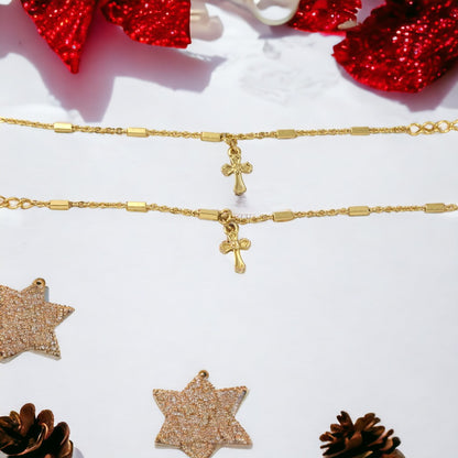 Pulsera de cruz de bebé hecha a mano bañada en oro