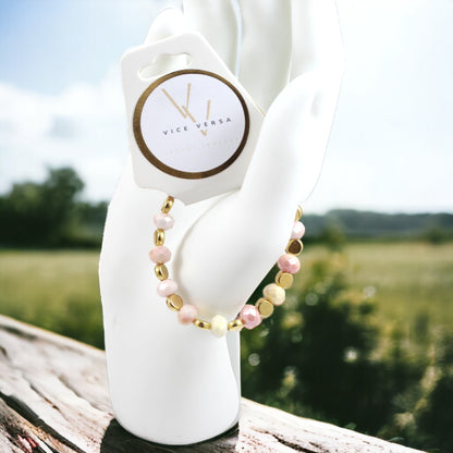 Pulsera elástica con cuentas de cristal de color rosa y amarillo