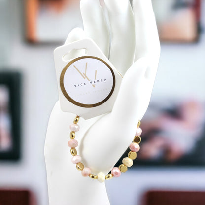 Pulsera elástica con cuentas de cristal de color rosa y amarillo