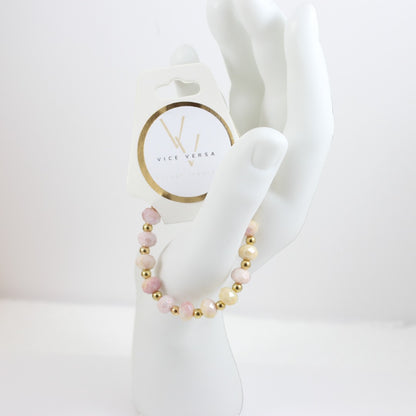 Pulsera elástica con cuentas de cristal de color rosa y amarillo