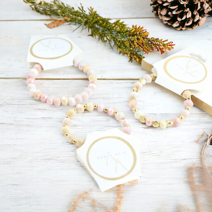 Pulsera elástica con cuentas de cristal de color rosa y amarillo