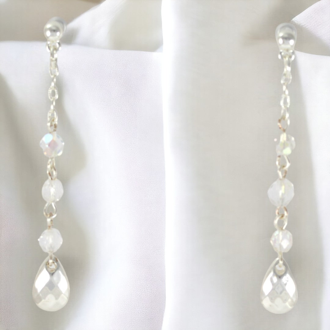 Pendientes largos de cristal bañados en plata de ley de 24 quilates