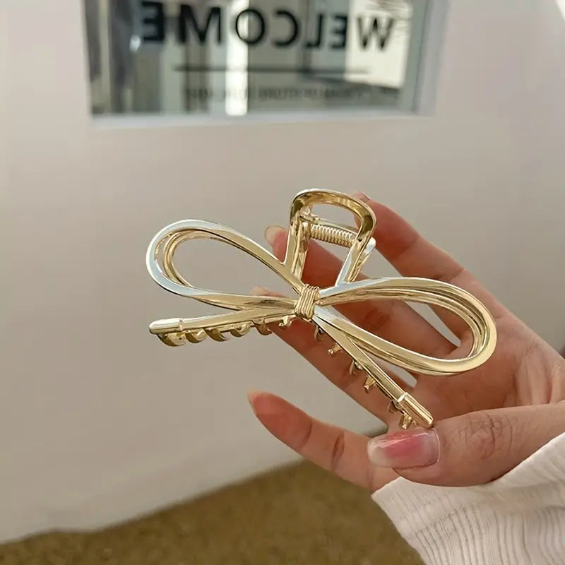 Pinza para el pelo con forma de metal dorado 